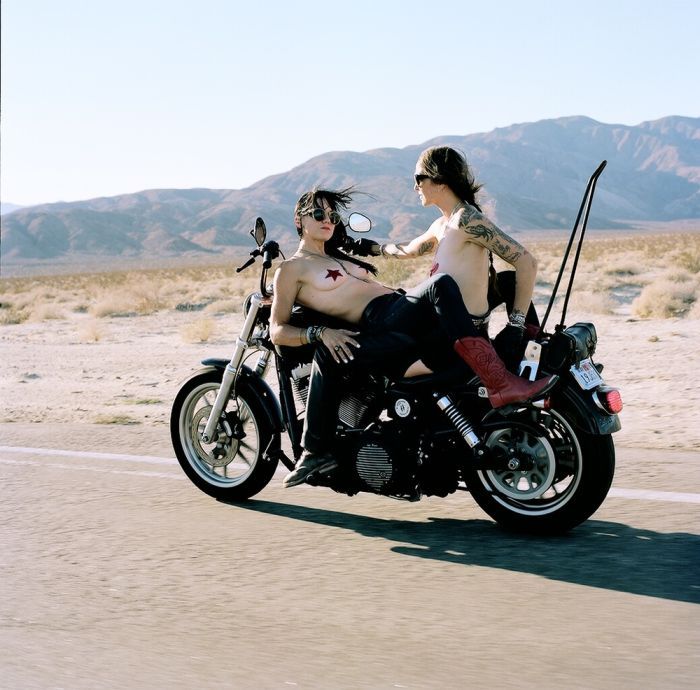 Girls on a motorcycle in Terezin